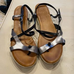 Worn but has good life left. Real leather